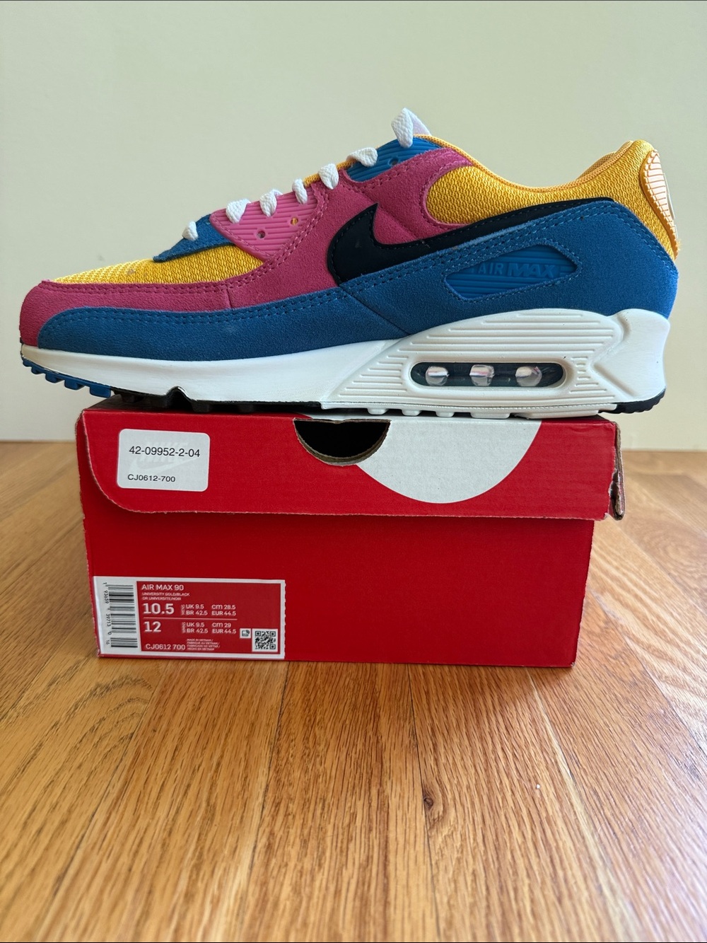 Nike Air Max 90 in Yellow, Pink, Blue, and Black